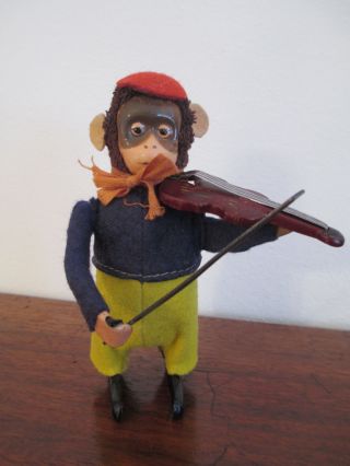 Schuco Tanzfigur Affe Mit Geige Bild
