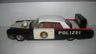 Altes Polizeiauto Amerikanische Ausführung,  Porsche Blechspielzeug Bild