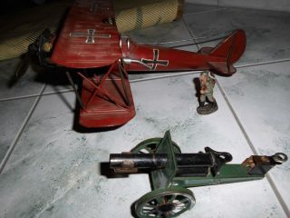 Blechspielzeug Flugzeug Und Kanone,  Soldat Bild