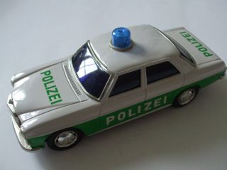 Blechspielzeug Polizeiauto Mercedes - Benz /8 („strich - Acht“) W 114 / W 115 M.  1:18 Bild