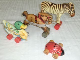 Ddr 4 Alte Holztiere Spielzeug Nachziehspielzeug Tiere Mit Rollen Bild