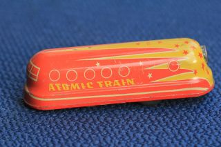 Blechspielzeug,  Spielzeugzug „atomic Train“. Bild