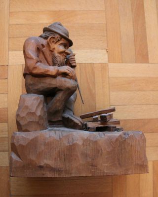 Holzschnitzerei Mann Am Feuer - Bild
