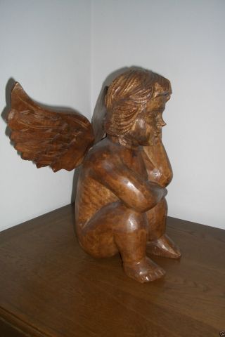 Holzschnitzerei - Schöner Engel Sitzend Bild