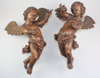 Paar Putti,  Engel,  19.  Jhd. ,  Linde Holz Geschnitzt,  Braun Lasiert,  Länge 35/36cm Bild