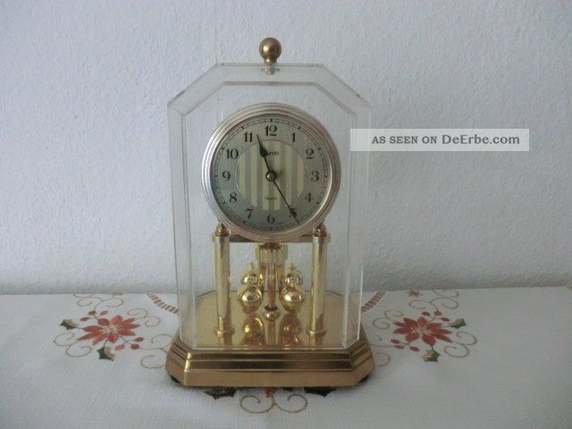 Tischuhr Kaminuhr Marke Kundo Quartz Uhr Mit Drehpendel Gefertigt nach 1950 Bild