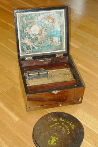 Polyphon Platten Spieluhr,  Um 1900 Mit 12 Stck.  20,  5 Cm Blech Platten,  Spieldose Bild