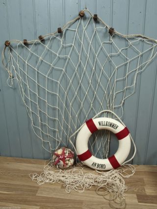 Fischernetz 1,  2x2,  5m Natur 7 Schwimmer,  36cm Rettungsring R/w,  Muschelkorb Bild