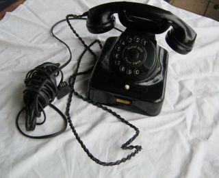 älteres Schwarzes Bakelit Telefon Mit Wählscheibe Bild