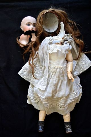 Puppe - Frankreich - Mitte 19.  Jahrhundert - Defekter Kopf Bild