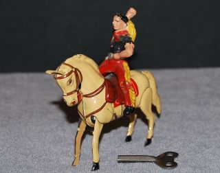 Köhler Figur Cowboy Auf Springendem Pferd,  Mit Uhrwerk,  Beige,  Blech,  Us - Zone Bild