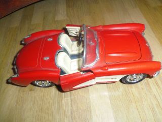Altes Spielzeugauto,  Blechauto,  Chevrolet - Cabrio - Altes Modellauto Bild