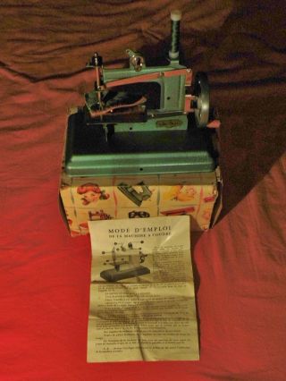 Kindernähmaschine Ca.  1960,  Blechspielzeug,  Nähmaschine Rose Marie,  Mit Karton Bild