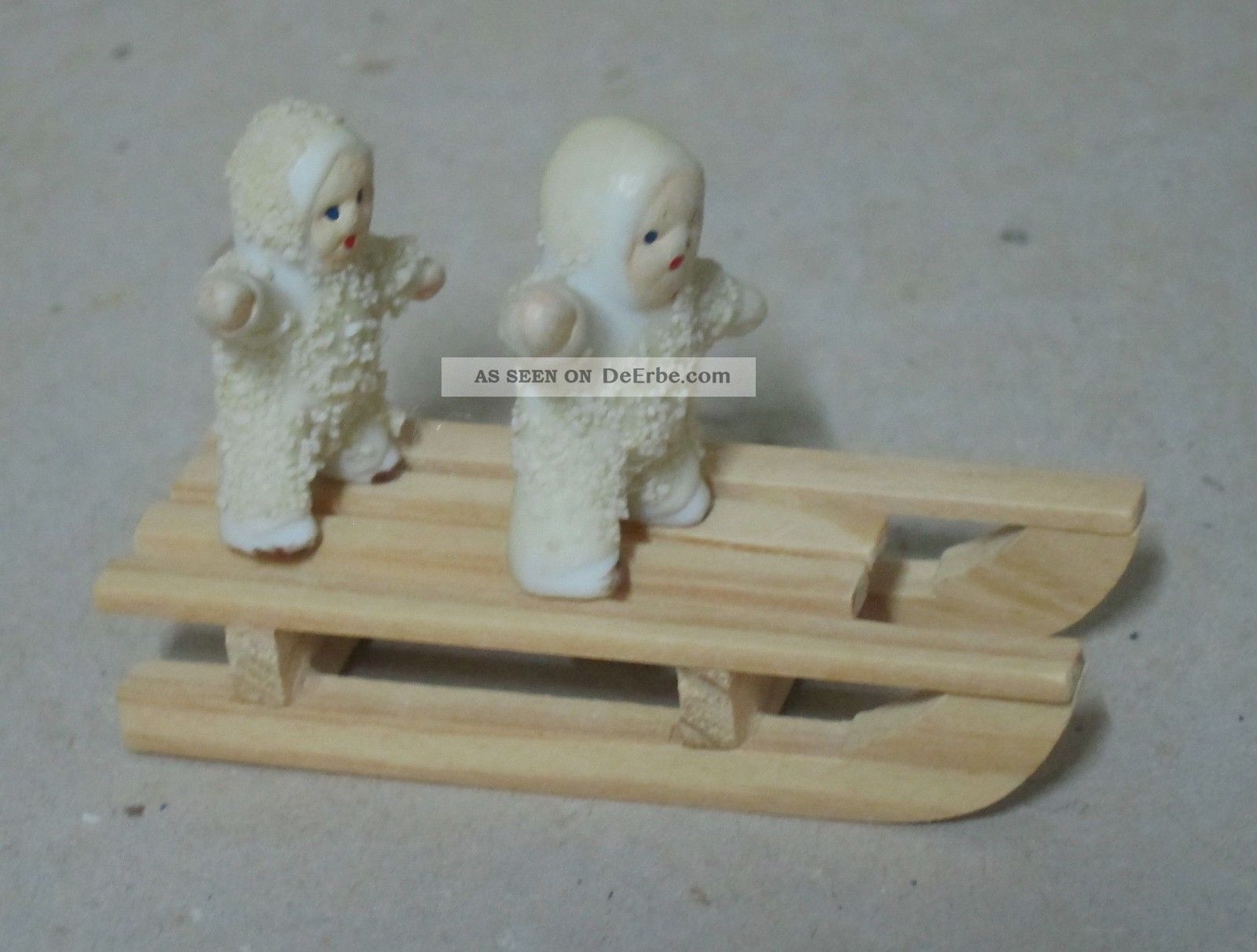 Schneekinder - Mit Schlitten Porzellankopfpuppen Bild