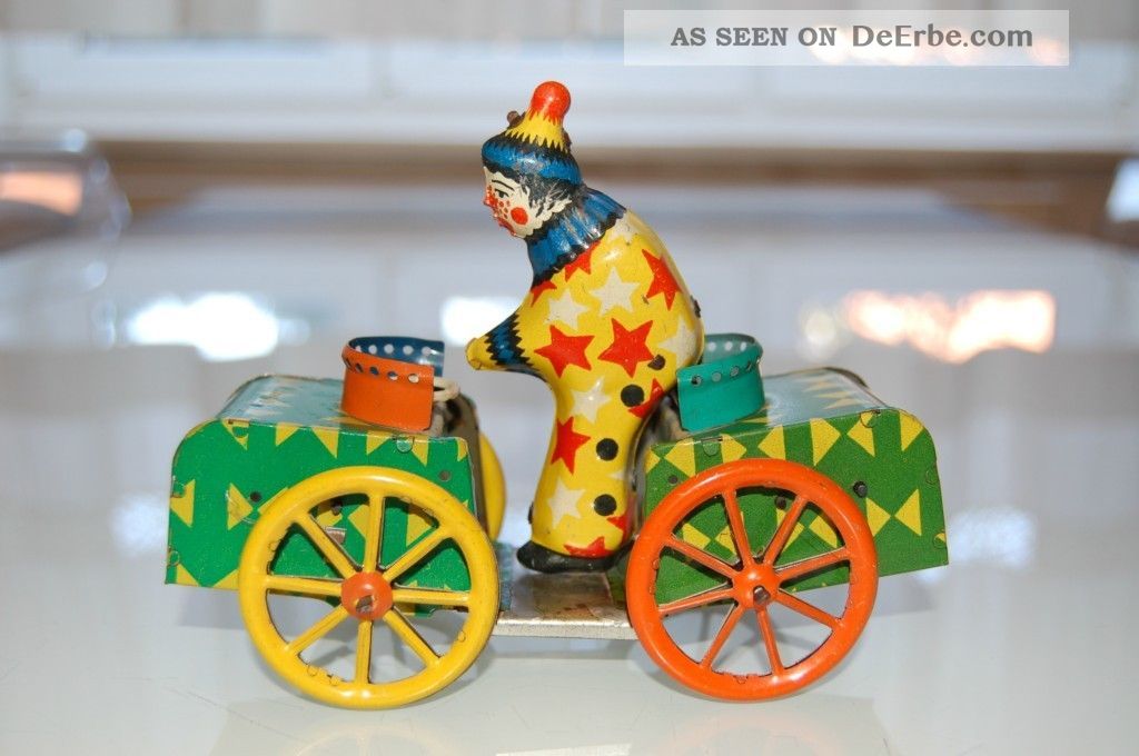 Blechauto Mit Clown Original, gefertigt 1945-1970 Bild
