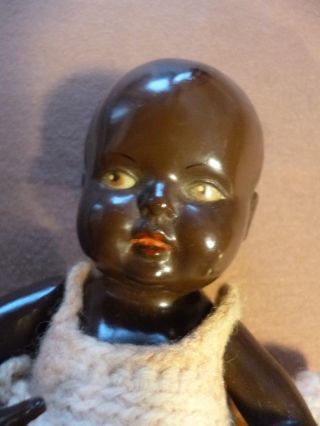 Schildkröt Negerbaby (schwarze Puppe) Bild