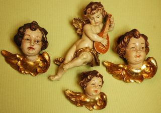 Holzputten - Puttenfiguren Bild