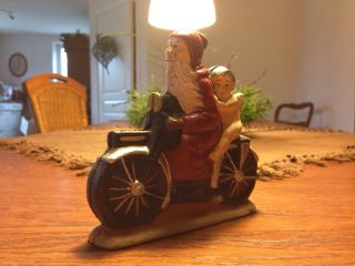 Weihnachtsmann Mit Engel Auf Motorrad Bild