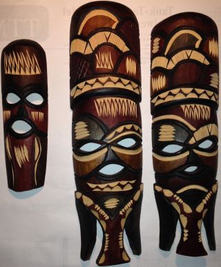 Dekorative Holz - Masken In Drei Verschiedenen Größen Bild