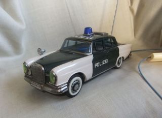 Blechspielzeug Auto Mercedes 230 Heckflosse Polizei Japan Ichiko 60er Jahre Bild