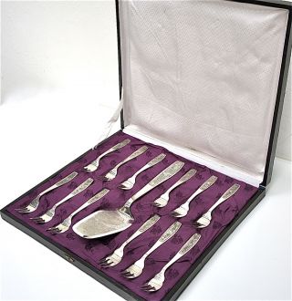 12 Kuchengabeln,  1 Tortenheber,  900 Silber In Aufbewahrungs - Schatulle.  Antik. Bild